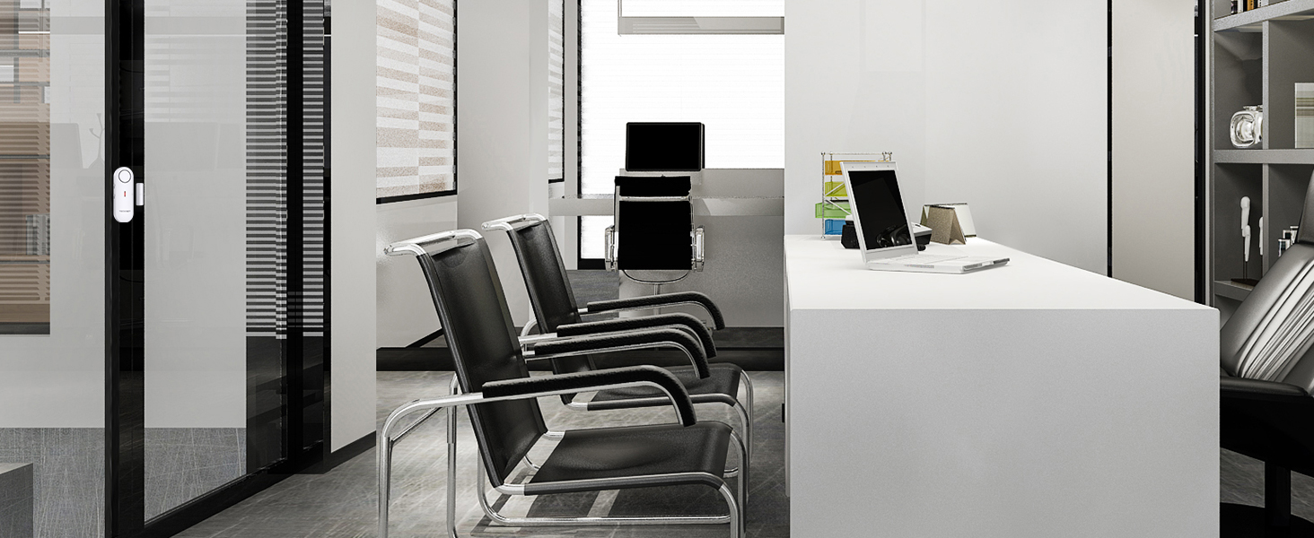 Modern office reception area with white desk, multiple black visitor chairs, and minimalist interior design elements.