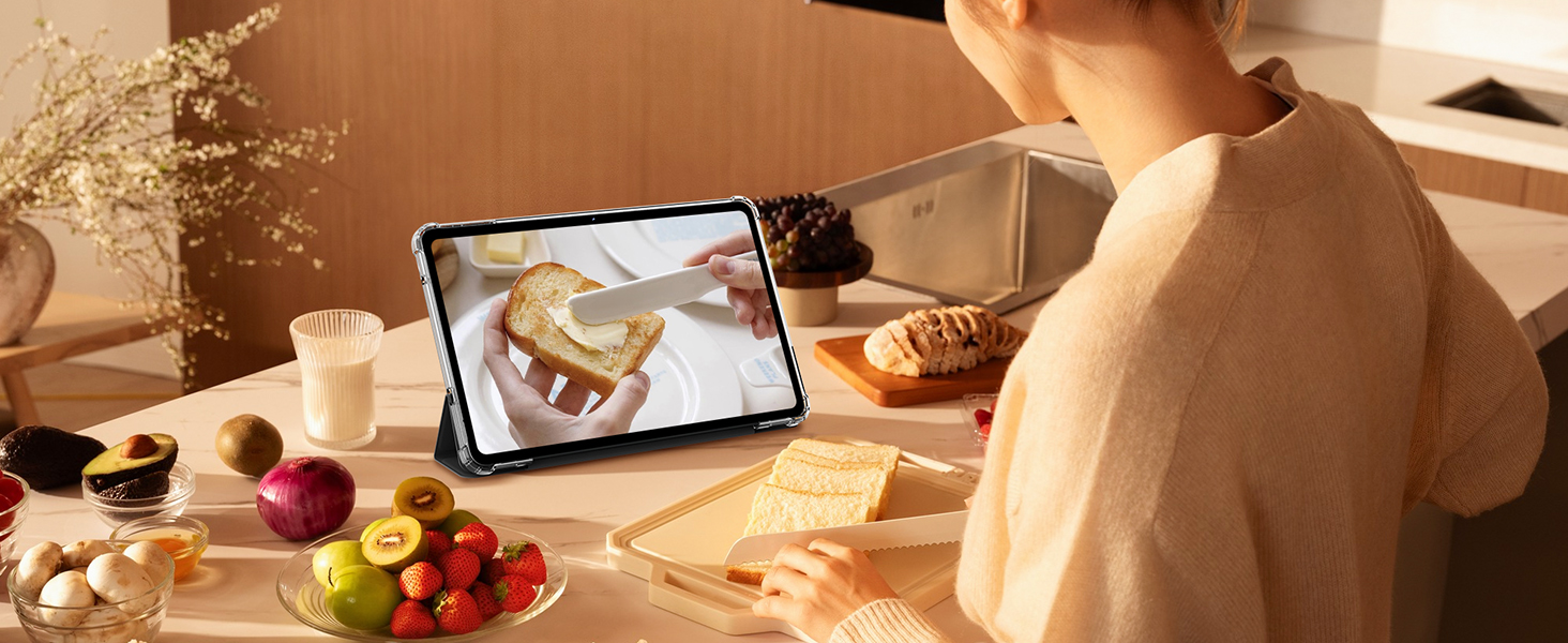 Cropped view of someone using a mobile device in a warm-lit setting with blurred food items visible in background.