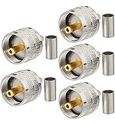 Five silver cylindrical metal objects with ridged sides and smooth tops, likely electronic components or connectors.