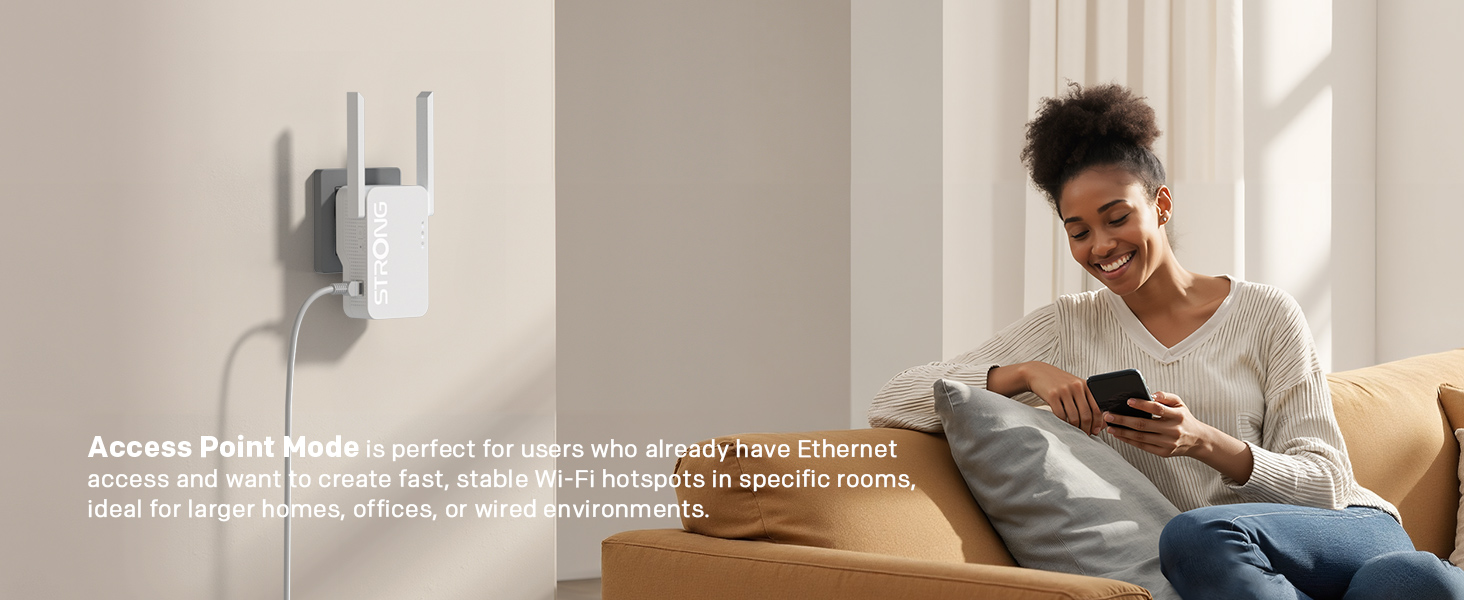 Woman sitting indoors wearing mustard/gold colored ribbed sweater, using device or product, shown in home interior setting with wall and window.