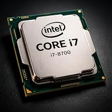 Text reads 'Intel CORE i7 i7-8700'. Close-up of Intel processor chip showing metallic surface and product branding against dark background.