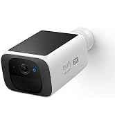 Outdoor security camera with large solar panel. White base unit with dome-shaped black camera featuring multiple lenses. Blue indicator light visible.