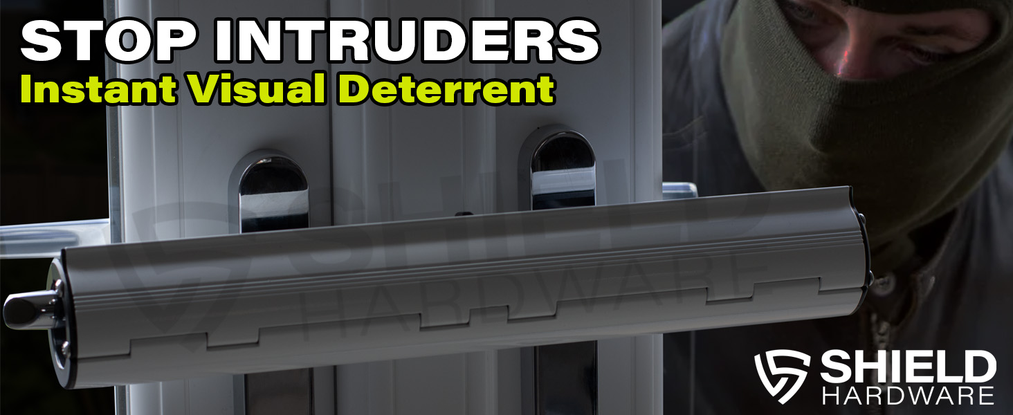 Text reads 'STOP INTRUDERS' and 'SHIELD HARDWARE'. Security-related product marketing image showing door hardware installation.