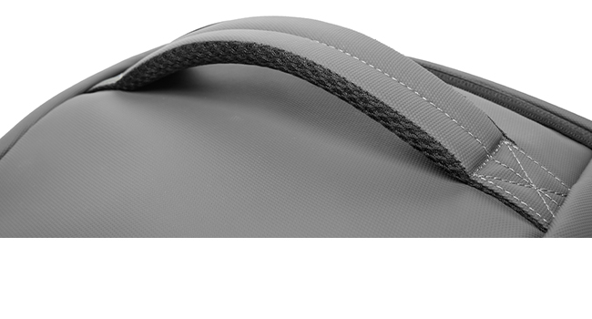 Gray fabric shoulder bag or tote with carrying handle strap, shown from overhead angle on white background.