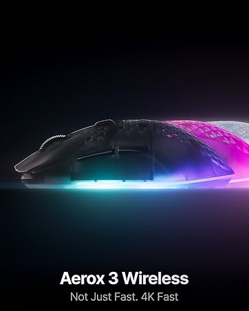 Text reads 'REACH THE APEX AND LIGHT IT UP' with 'Connect your Streamlites keyboard to GS, Controllerss in Engine, gtx with Prism, and unlock pure RGB glory justa poke at the keys' tagline. Mechanical gaming keyboard with RGB rainbow backlighting and various game-related keycaps displayed.