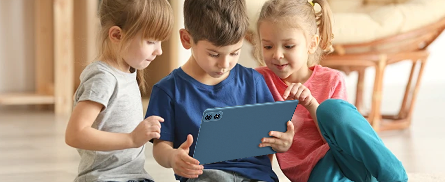 Three children sitting on the floor, focused on a blue tablet device. The tablet appears to have a protective case and dual rear cameras.