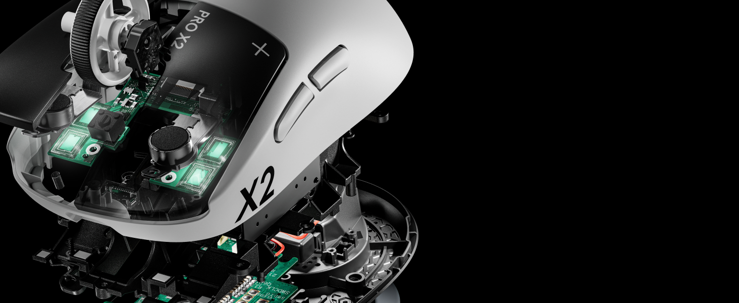 Computer mouse on textured black surface with internal green LED illumination visible through translucent shell.