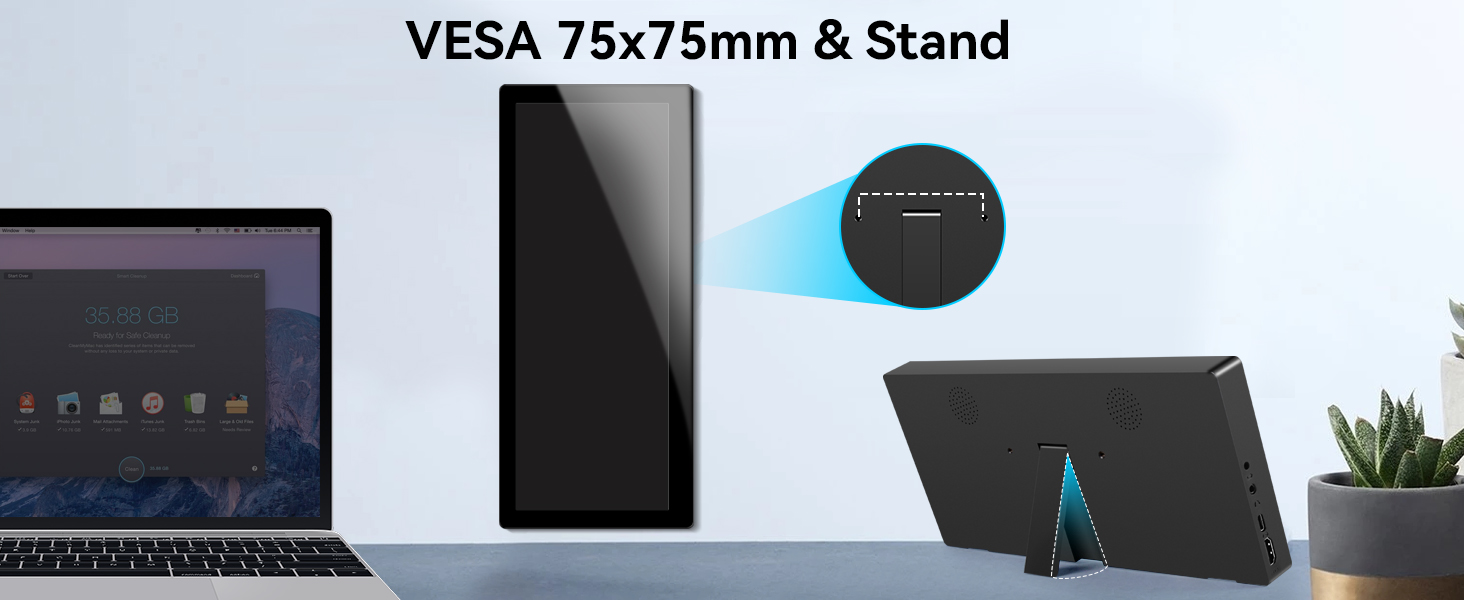Text reads 'VESA Pro Touch & Stand'. Black vertical computer monitor or display with stand, shown with laptop and desk accessories on white surface.