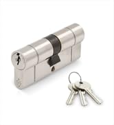 Set of brass or gold-colored door lock cylinders and keys shown in sequence, demonstrating security hardware components.