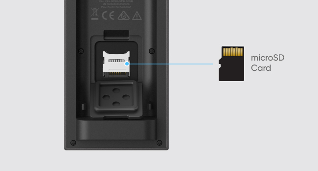 Close-up of device port interface showing microSD card slot and connector port with technical symbols.