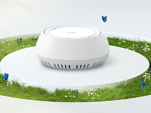 White circular smoke detector or alarm device shown from multiple angles, featuring a modern minimalist design with smooth surfaces.