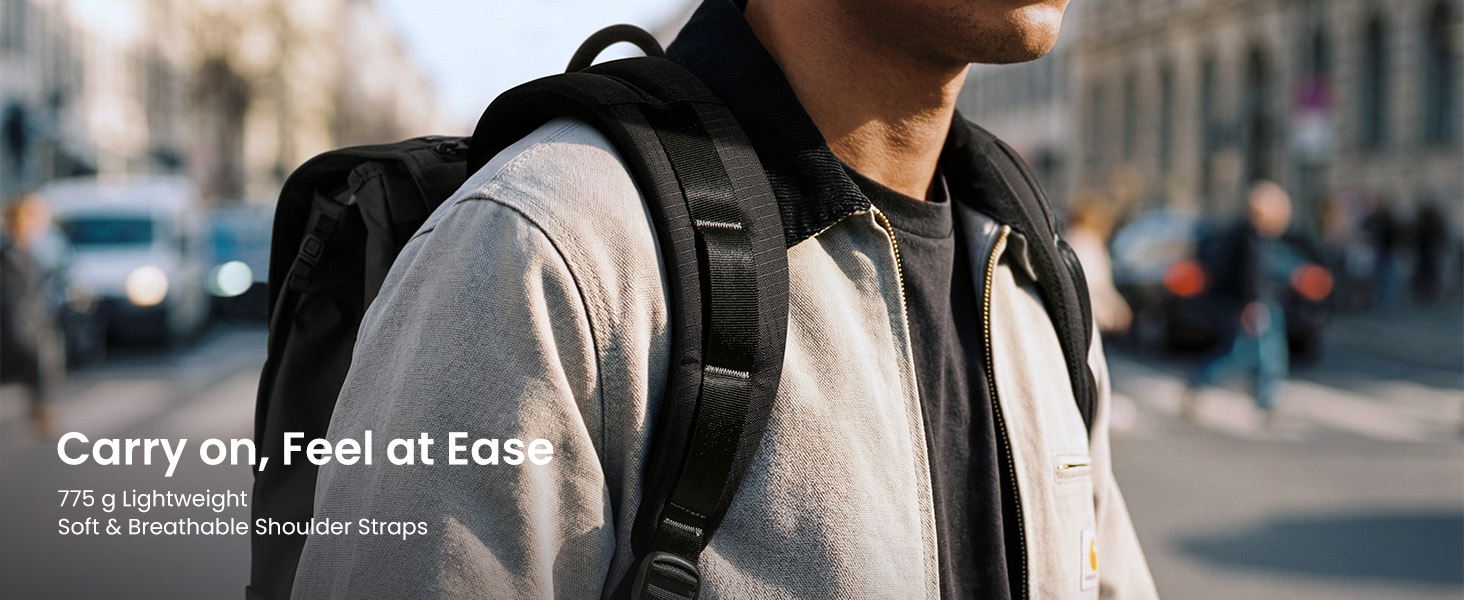 Text reads 'Carry on. Feel at Ease' with additional tagline text below. Urban outdoor scene with person wearing backpack and casual clothing, blurred city street background.