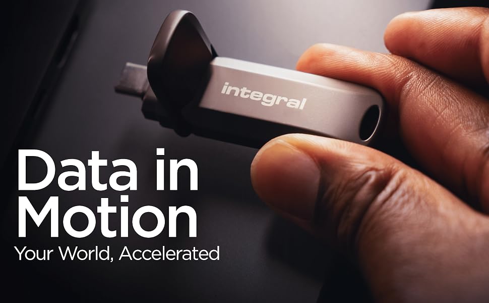 Text reads 'Data in Motion' and 'Your World, Accelerated'. Close-up shots of hands holding what appears to be a small electronic device.