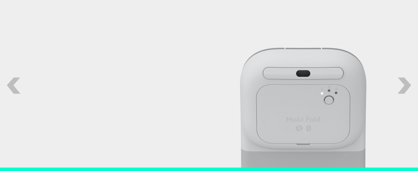 White compact device shown from back view with central button and USB port, displayed against light background. Navigation arrows visible on sides.