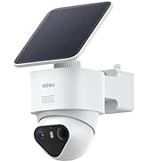 Solar panel mounted above dual-lens security camera with white and black coloring. Camera features prominent heart-shaped lens design and appears to be an outdoor surveillance device.