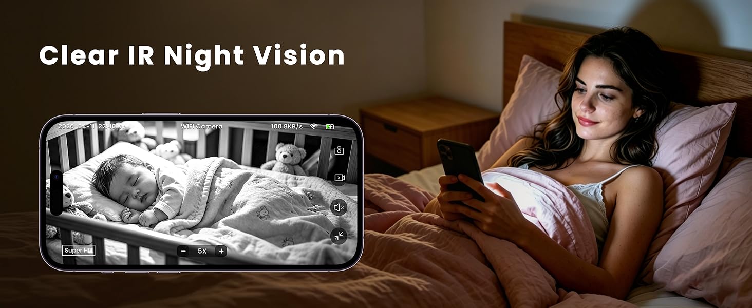 Text reads: 'Clear IR Night Vision'. Infrared thermal image of baby in crib displayed on smartphone screen beside woman in bed at night.