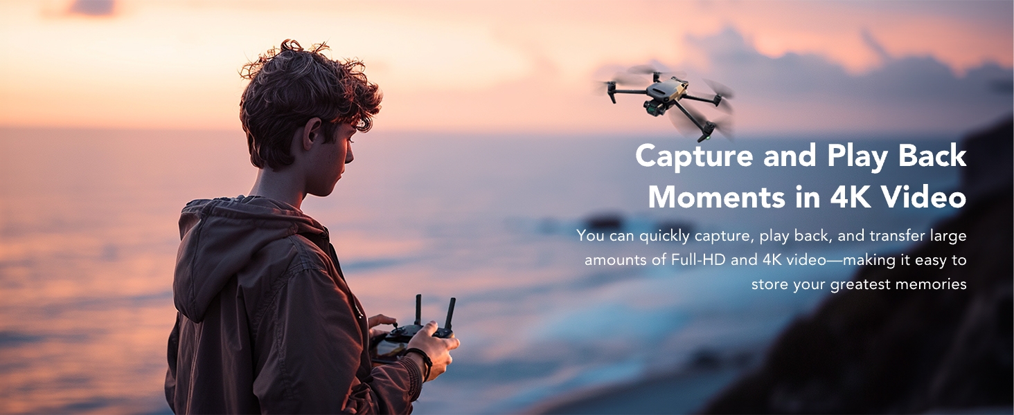 a boy flying a drone over the ocean.
