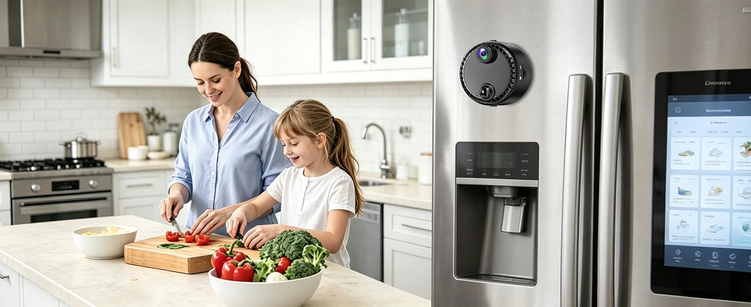 Kitchen scene showing woman and child preparing food together at counter with fresh vegetables, modern appliances, stainless steel refrigerator, and light-filled contemporary kitchen environment.