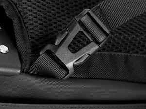Close-up views of a black electronic device from multiple angles, showing detailed surface texture and ports.