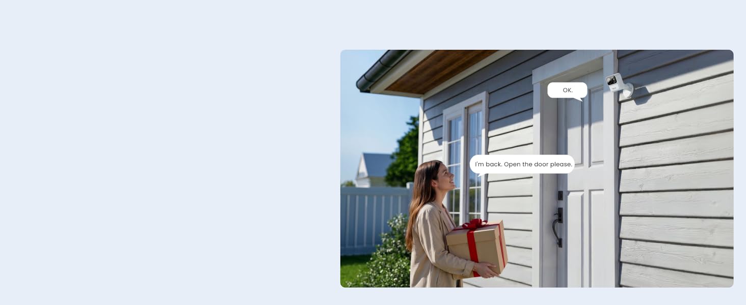 Woman in autumn clothing standing at house entrance with brown and tan suitcases, suggesting travel or arrival scene.