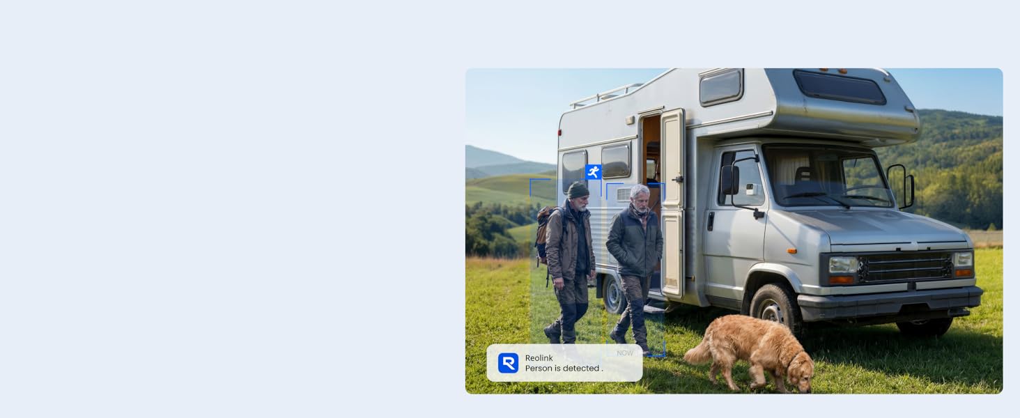 Daytime landscape photograph of blue camper van parked in scenic terrain with mountains in background and dog sitting beside vehicle. Social media icon visible in lower left corner.