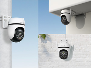 Three white wireless security cameras shown in different mounting positions: wall-mounted corner, eave-mounted, and table surface placement, demonstrating versatile installation options for monitoring.