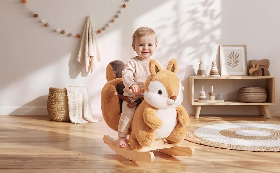Woman and child playing with wooden rocking horse toy in bright, minimalist nursery with shelving, pendant light, and white textiles.